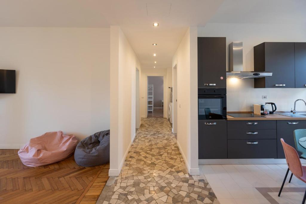 A kitchen or kitchenette at Gaffurio Apartments