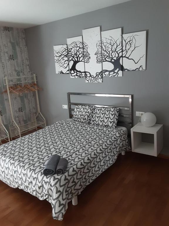 A bed or beds in a room at O IGREXARIO