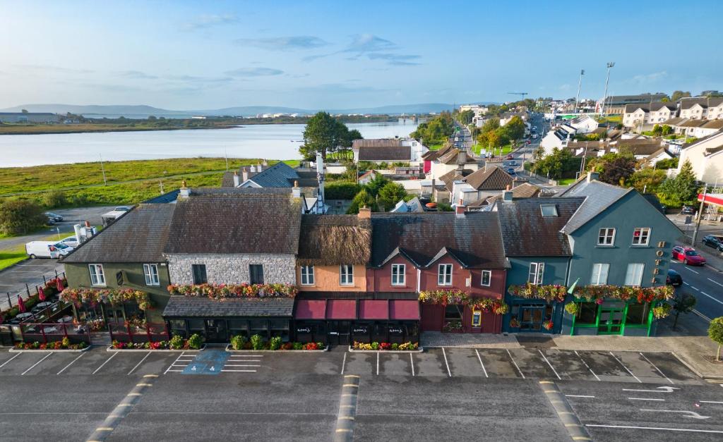 an aerial view of a town with a parking lot at The Huntsman Inn in Galway