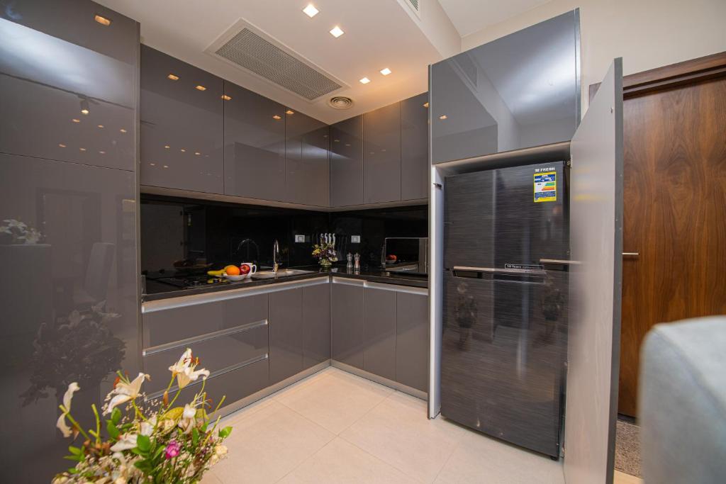 Kuchyň nebo kuchyňský kout v ubytování Elegance Tower