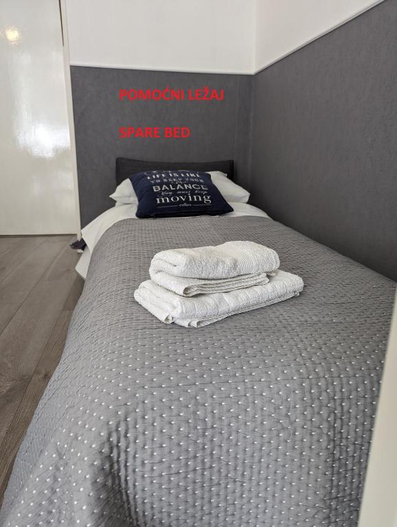 Postel nebo postele na pokoji v ubytování Apartman Plasse