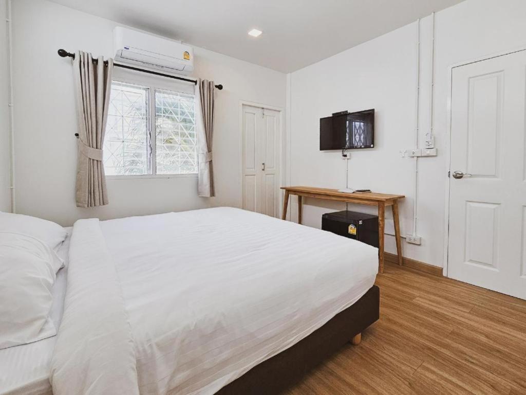 Postel nebo postele na pokoji v ubytování Casa Maya House