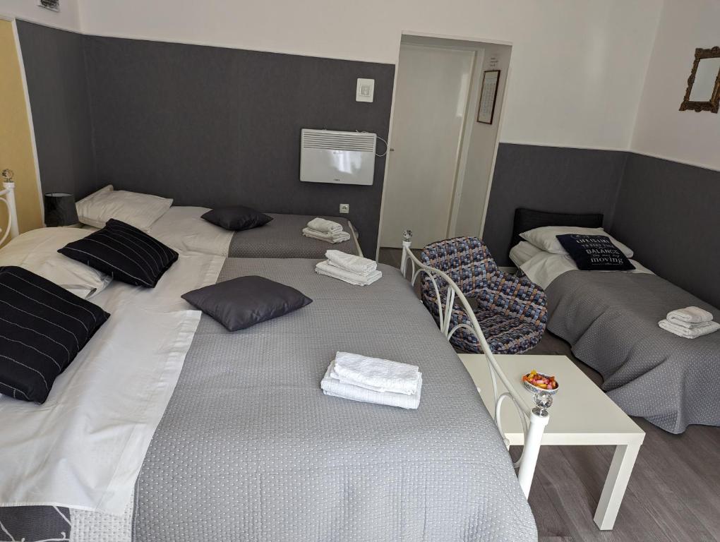 Postel nebo postele na pokoji v ubytování Apartman Plasse