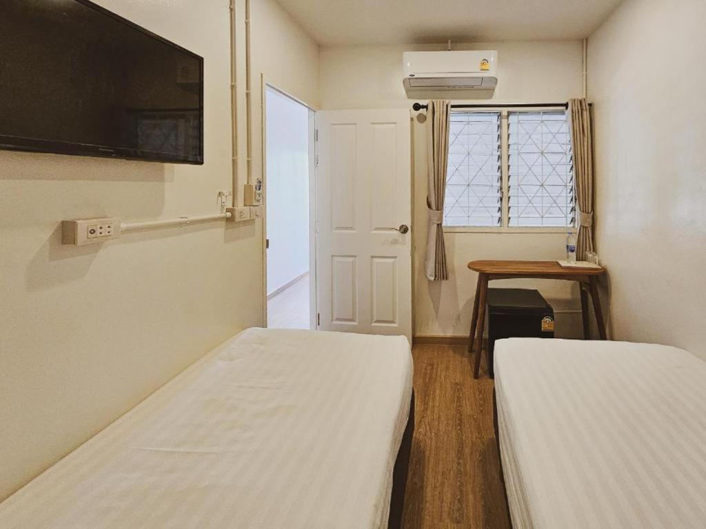Postel nebo postele na pokoji v ubytování Casa Maya House
