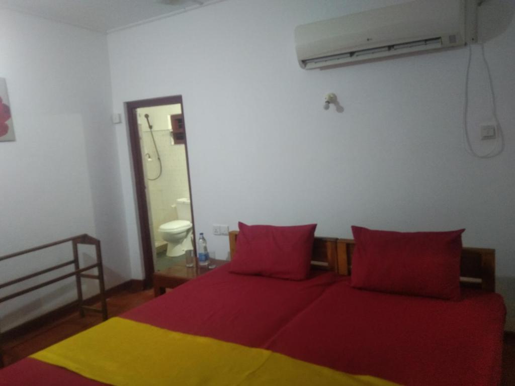 Postel nebo postele na pokoji v ubytování Beach Walk Villa