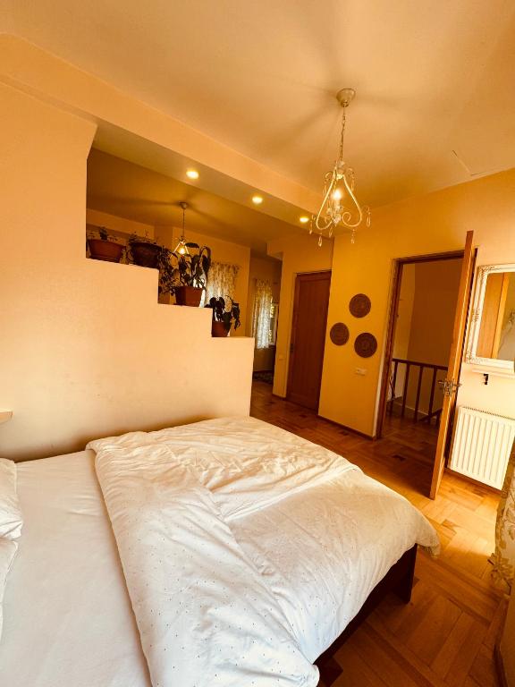 Postel nebo postele na pokoji v ubytování Sky Guest House