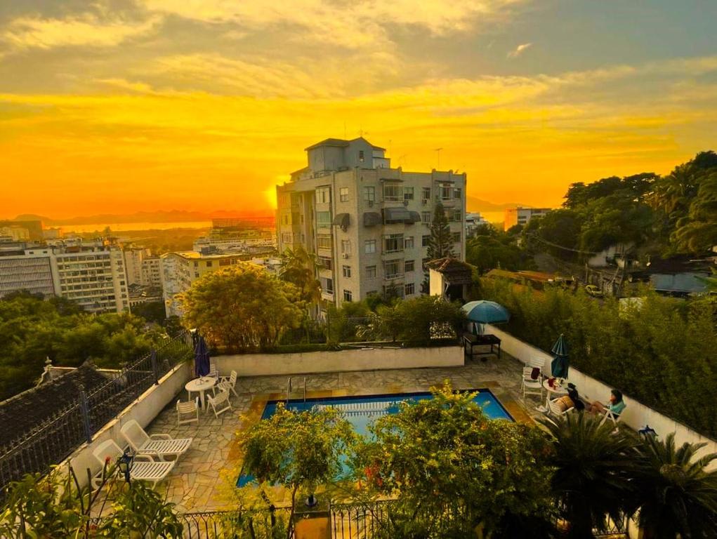 a view of a building with a swimming pool at Rio World Connection Hostel in Rio de Janeiro