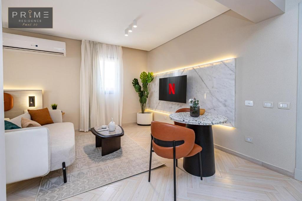 TV a/nebo společenská místnost v ubytování Prime Residence Point 90