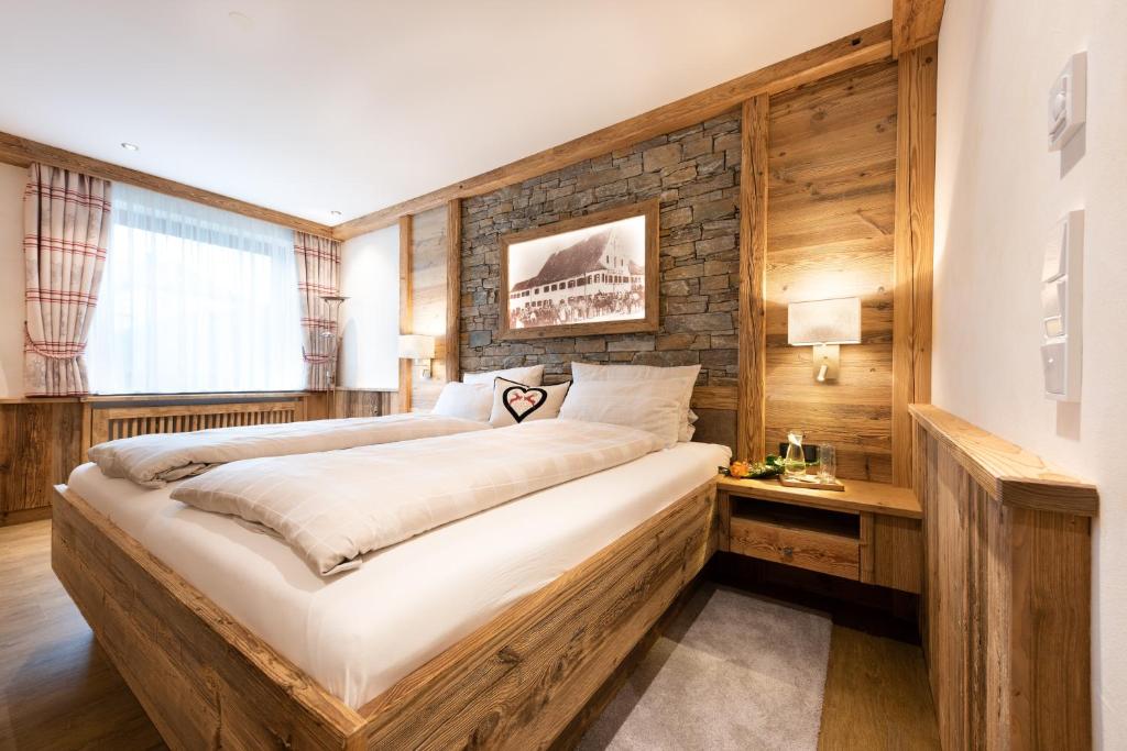 Postel nebo postele na pokoji v ubytování Wellness-Hotel ADLER