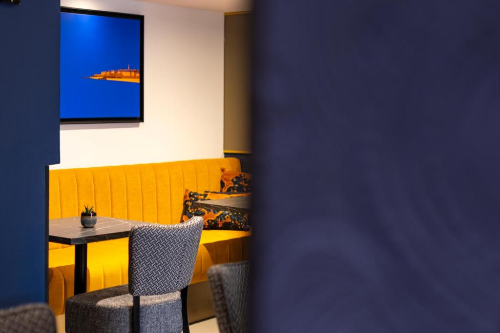 Posezení v ubytování Hôtel Le Nautilus