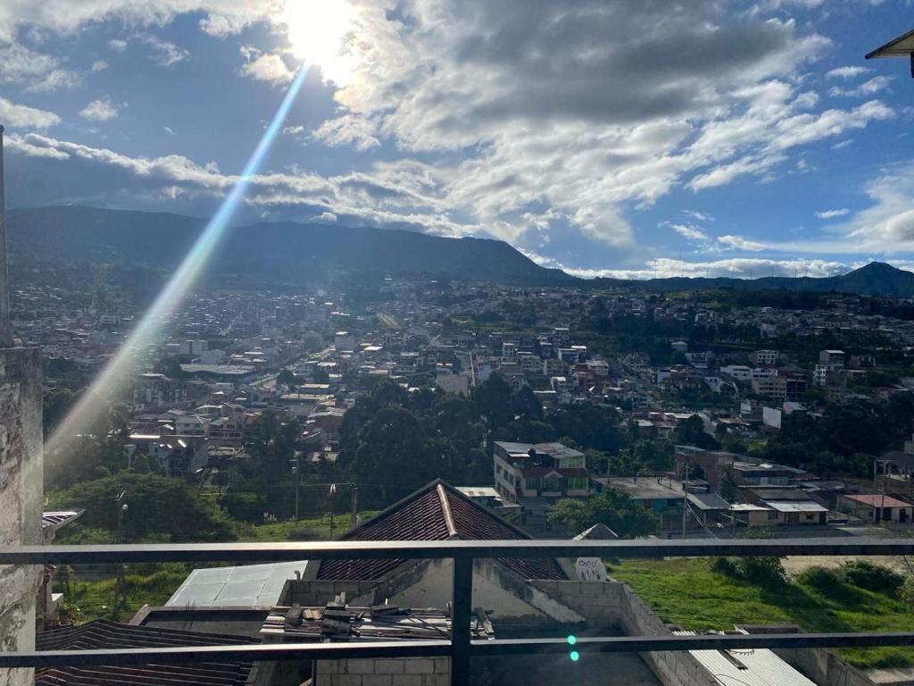 a view of a city from the balcony of a building at Pent House Exclusivo in Loja