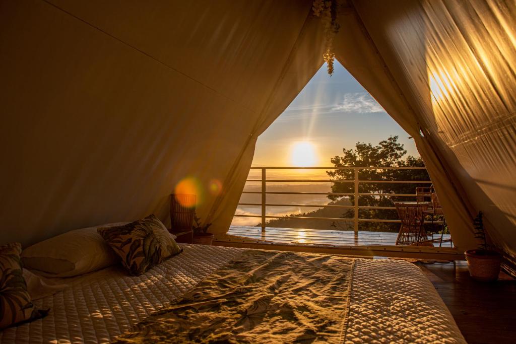 Postel nebo postele na pokoji v ubytování Quimera Glamping
