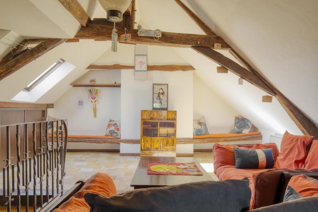 Jacuzzi et Vue sur Loire - Maison d'hôtes L'Odyssée - Apartamento De Dos Dormitorios