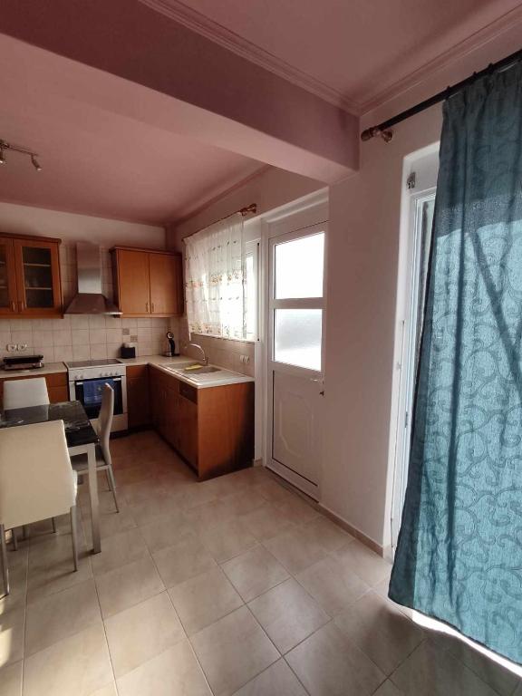 Kuchyň nebo kuchyňský kout v ubytování Dinos Pool Apartment