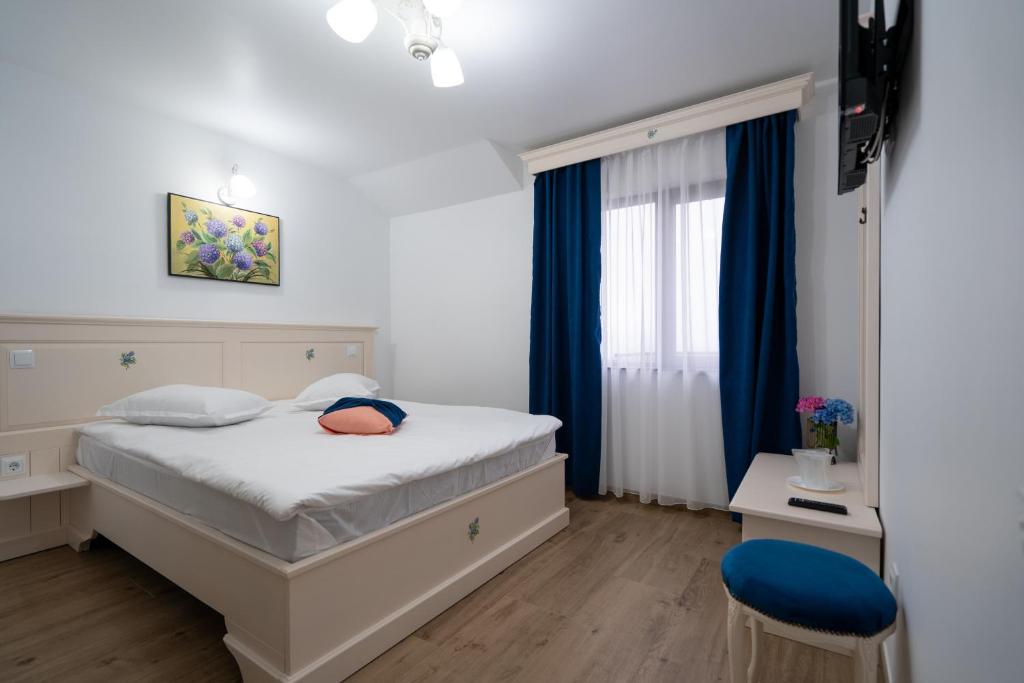 Postel nebo postele na pokoji v ubytování Vila N&D