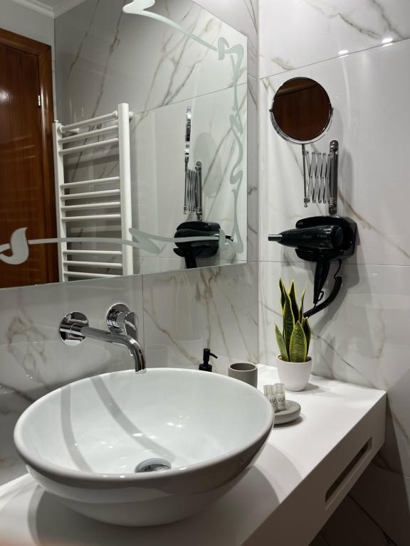 Ett badrum på Paggaio Escape Apartments