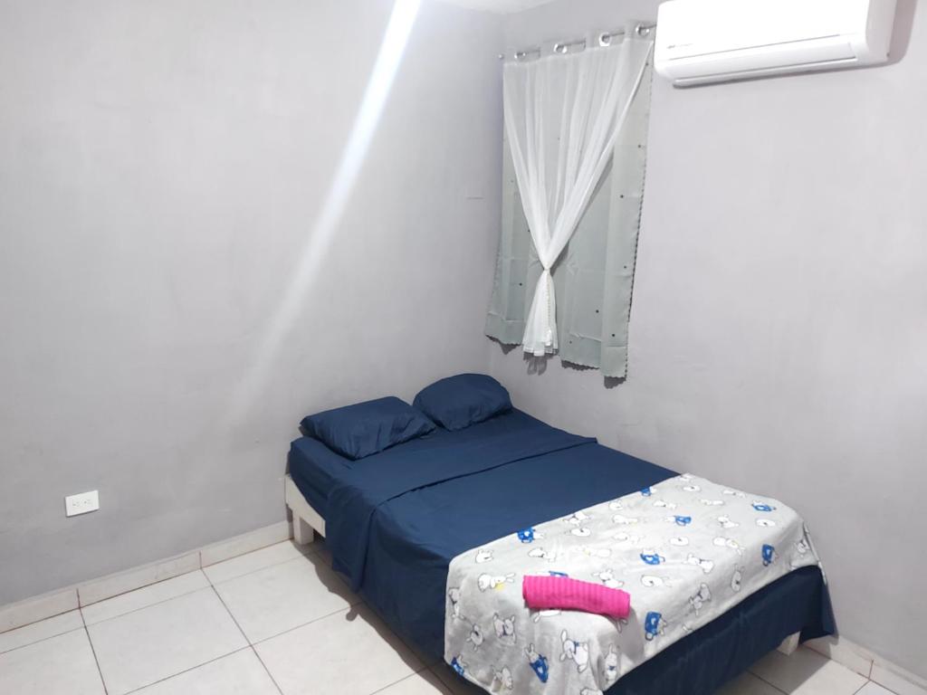 Ένα ή περισσότερα κρεβάτια σε δωμάτιο στο Residencia El Encanto