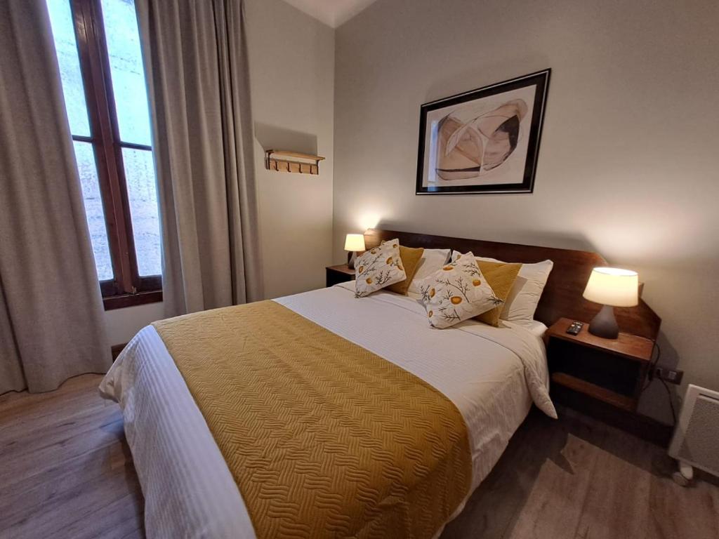Postel nebo postele na pokoji v ubytování Hotel Casa Aure