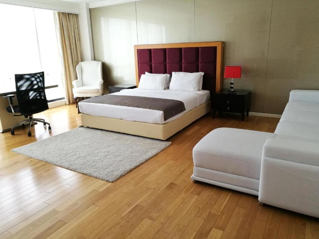 En eller flere senge i et værelse på The BTS Kuala Lumpur Bukit Bintang