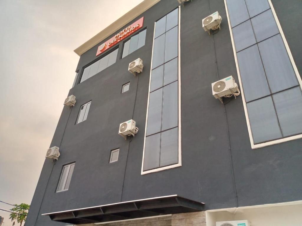 a black building with windows and speakers on it at HOTEL DEE NARIOS in Uyo