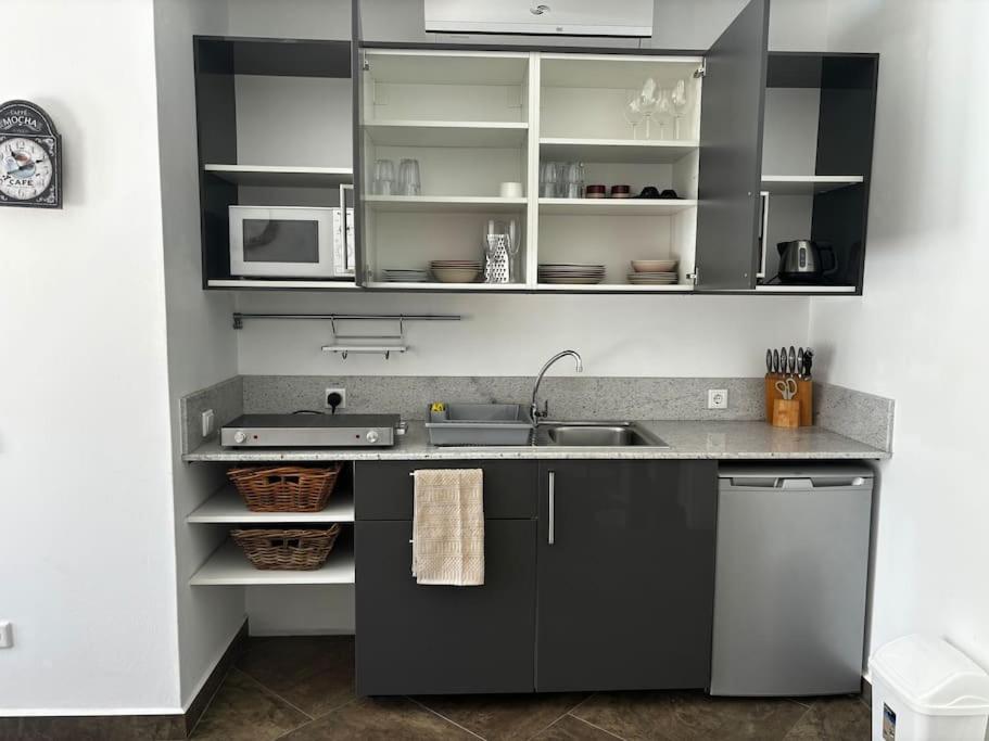 Kuchyň nebo kuchyňský kout v ubytování Appartement Coco