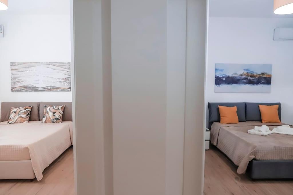 Postel nebo postele na pokoji v ubytování Casa Vacanze Menamè