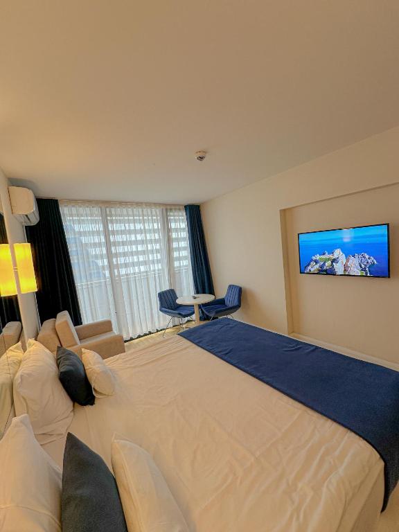 Postel nebo postele na pokoji v ubytování Luxury Batumi Hotel
