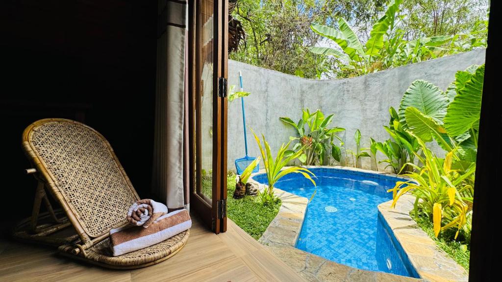 Bazén v ubytování Palmyra Nature Resort Sigiriya nebo v jeho okolí