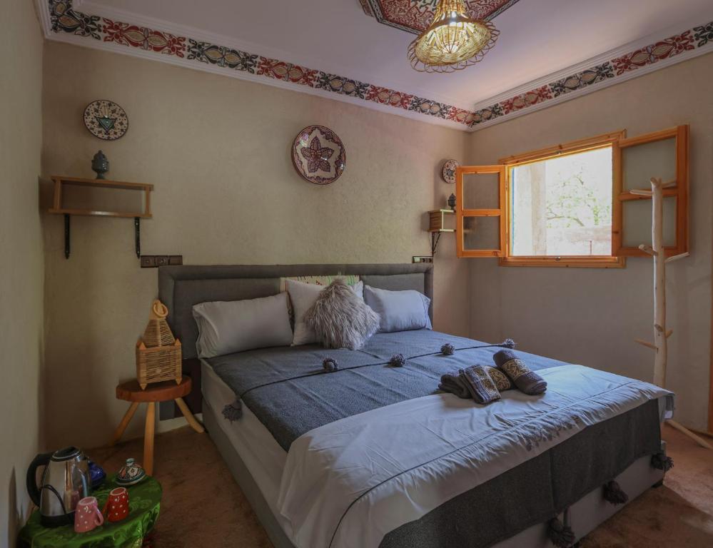 Postel nebo postele na pokoji v ubytování Atlas Haven