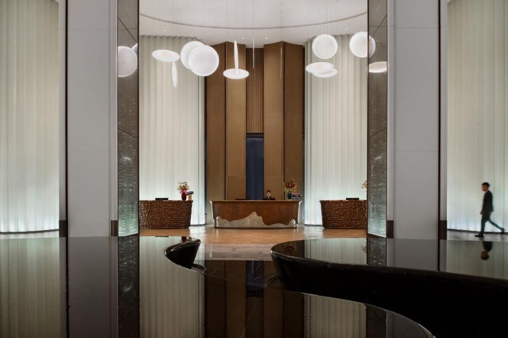 Posezení v ubytování Vignette Collection The Xanadu Guangzhou, an IHG Hotel