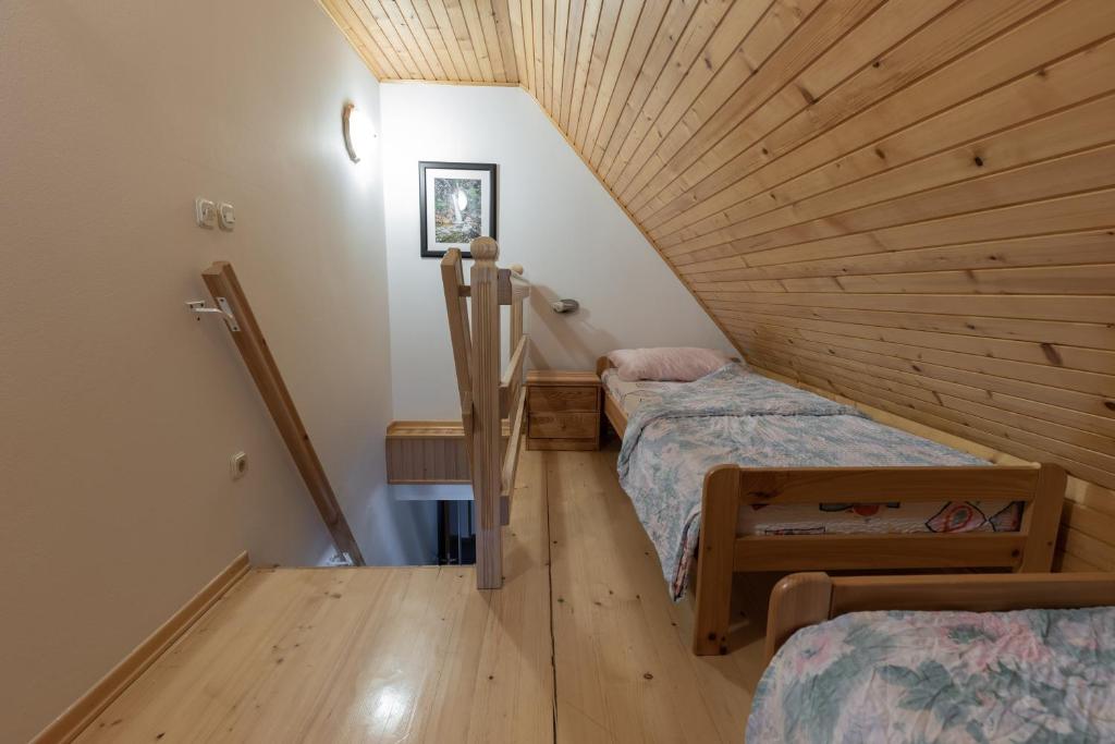 Postel nebo postele na pokoji v ubytování Metoja