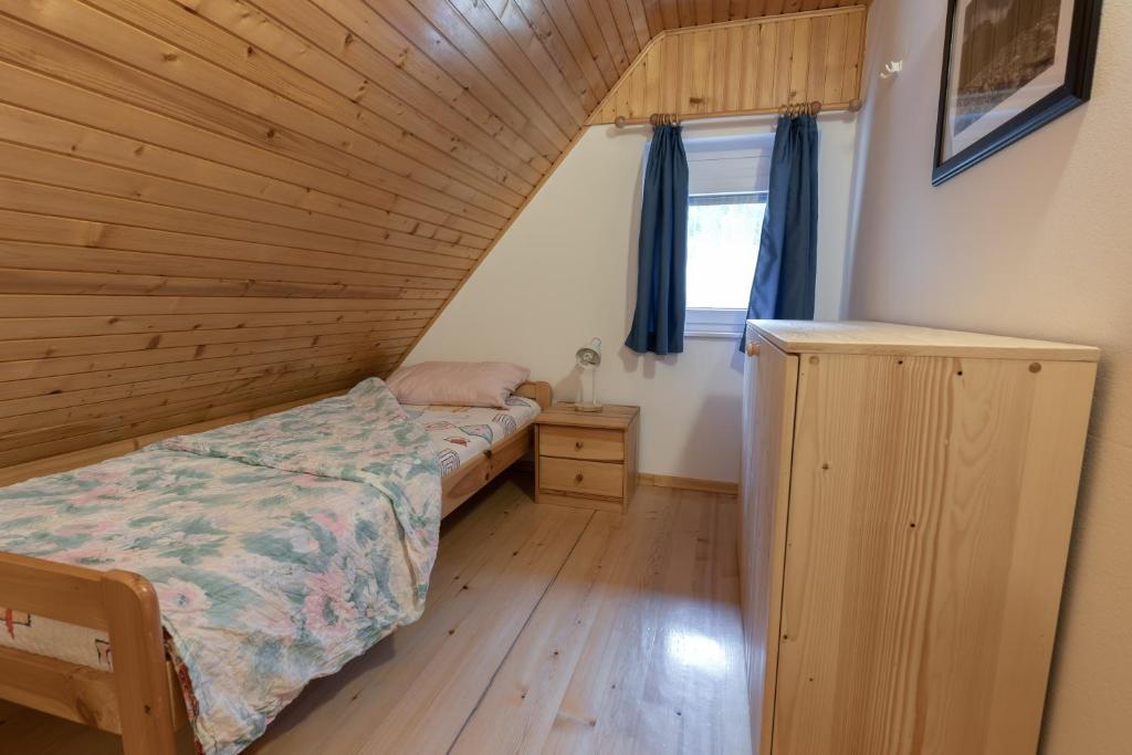 Postel nebo postele na pokoji v ubytování Metoja