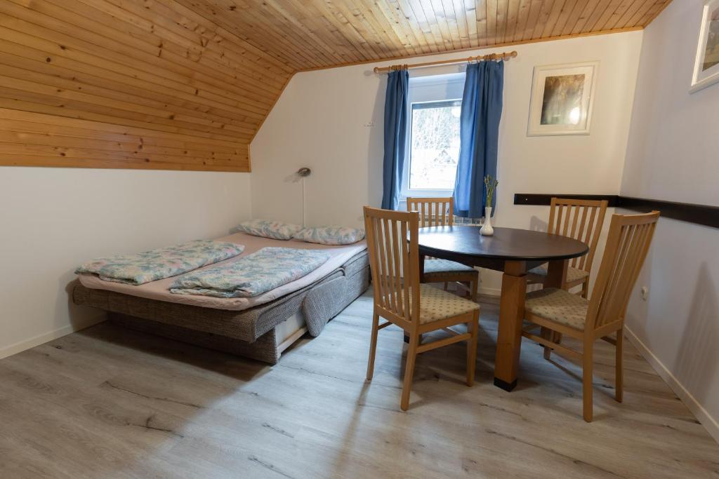 Postel nebo postele na pokoji v ubytování Metoja