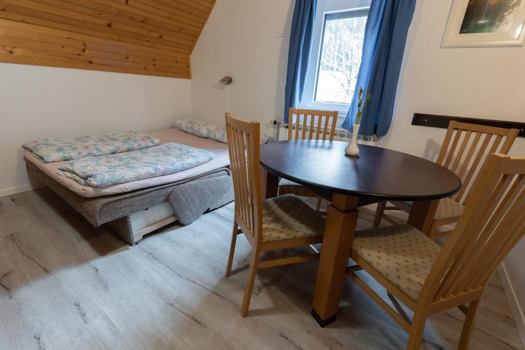 Postel nebo postele na pokoji v ubytování Metoja