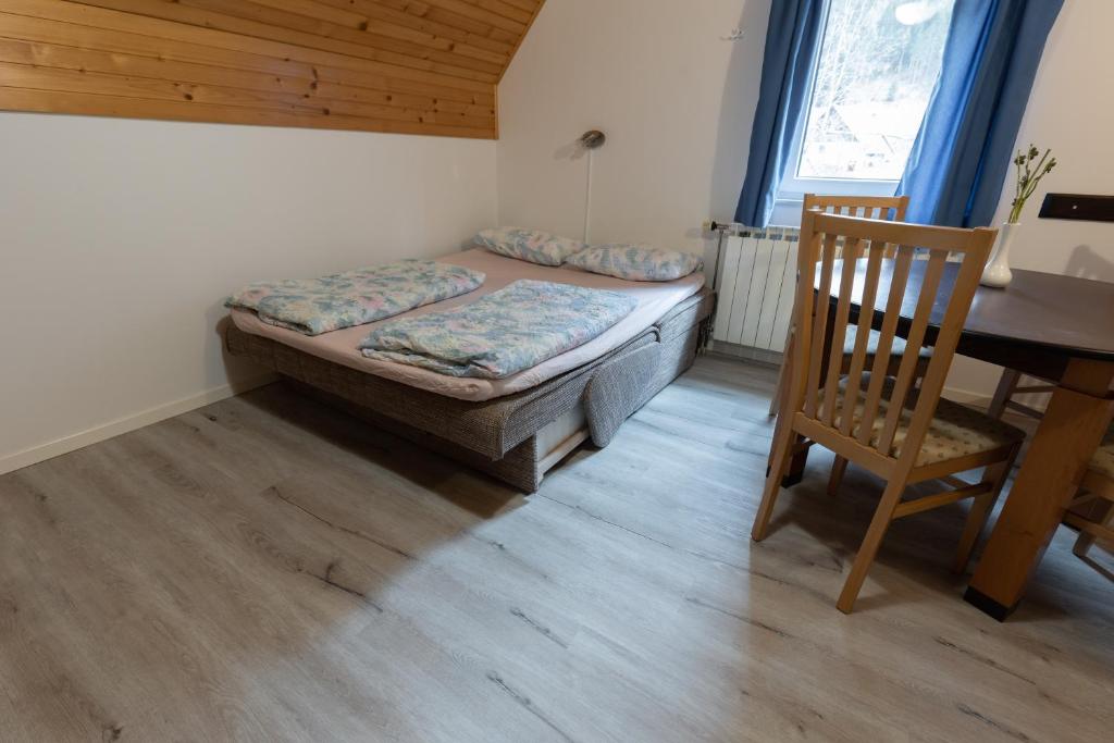Postel nebo postele na pokoji v ubytování Metoja
