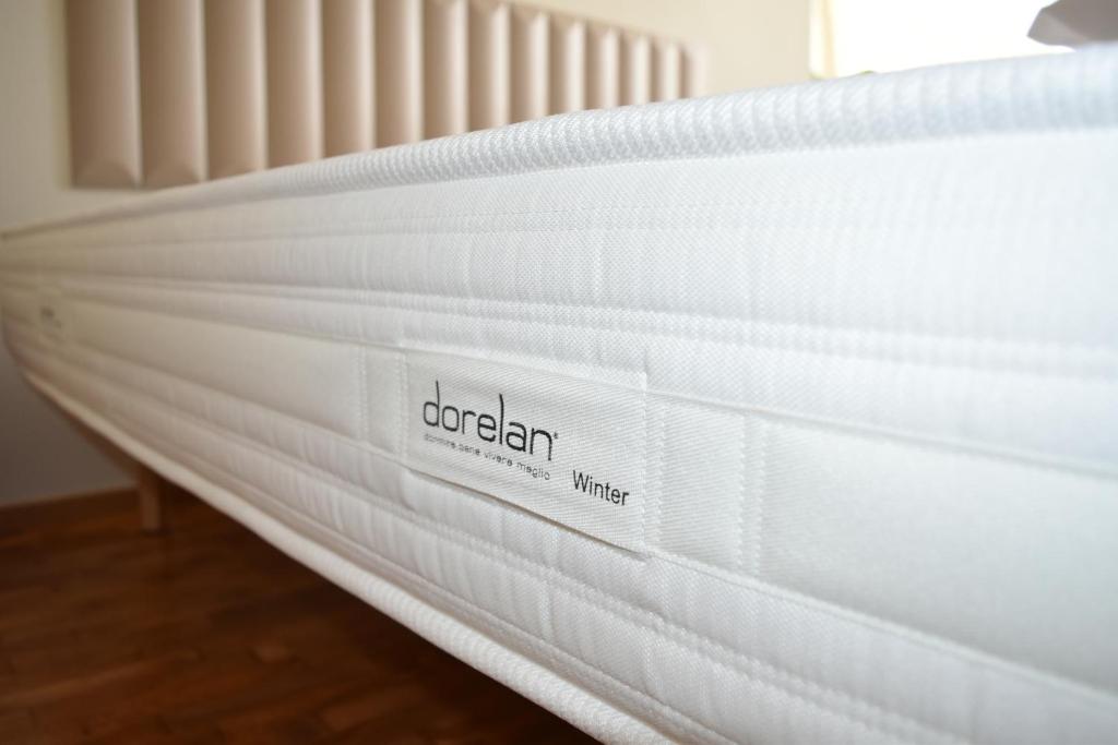 Postel nebo postele na pokoji v ubytování Namuri Comfortable Rooms