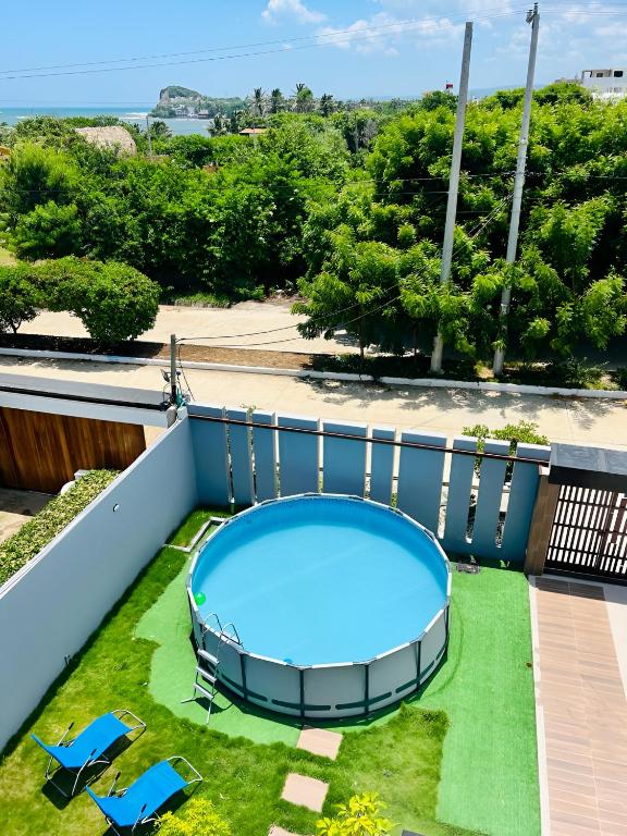 Bazén v ubytování AzulRest Casa de Verano nebo v jeho okolí