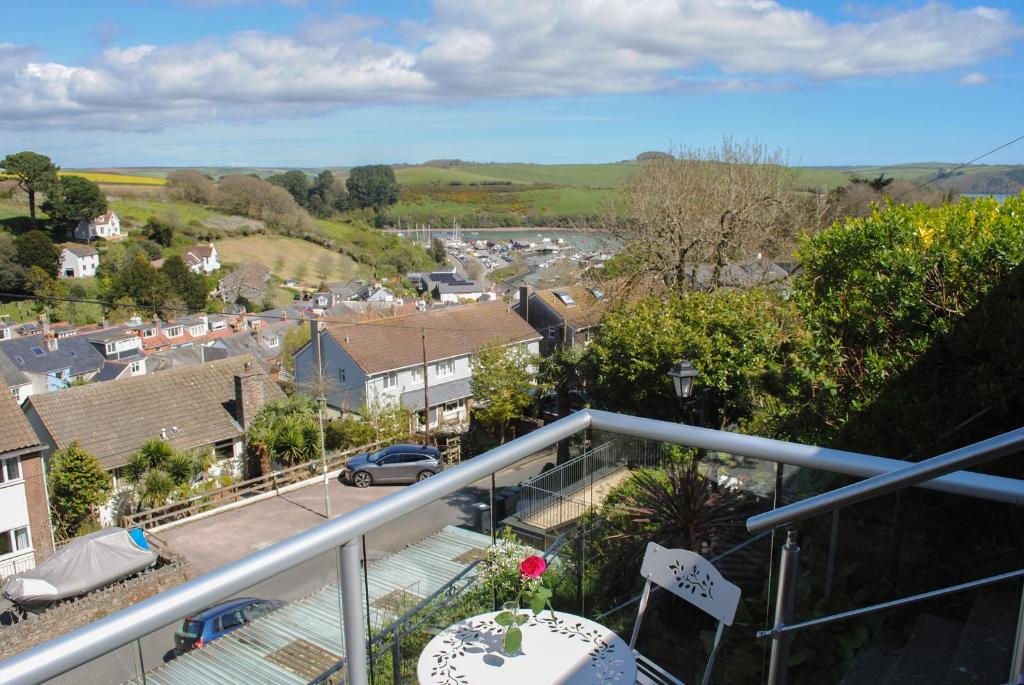 a view of a town from the balcony of a house at 2 Rockmount in Salcombe
