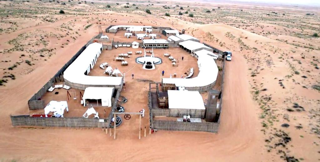 an aerial view of a ranch in the desert at Margham Desert Safari Camp in Margham