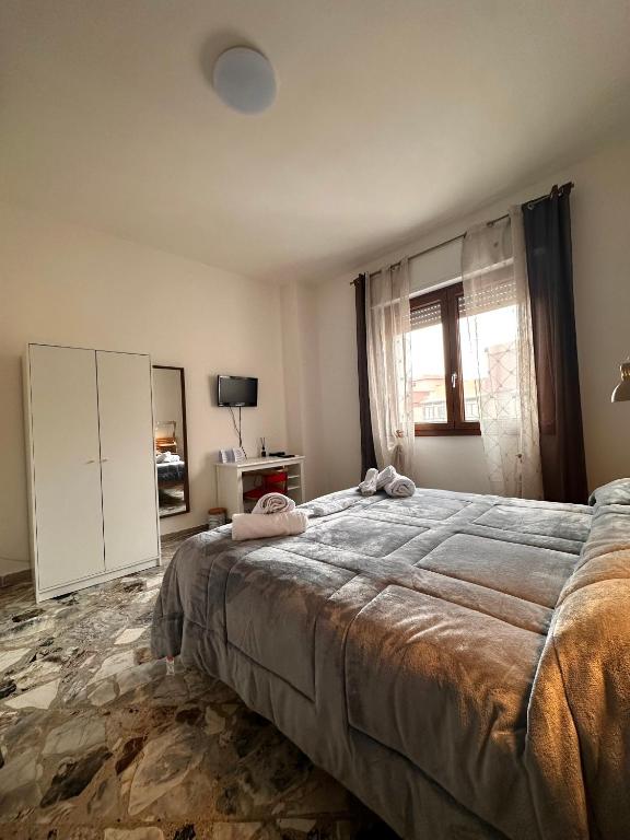 Postel nebo postele na pokoji v ubytování B&B Tre Ponti