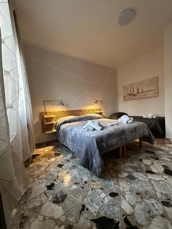 Postel nebo postele na pokoji v ubytování B&B Tre Ponti