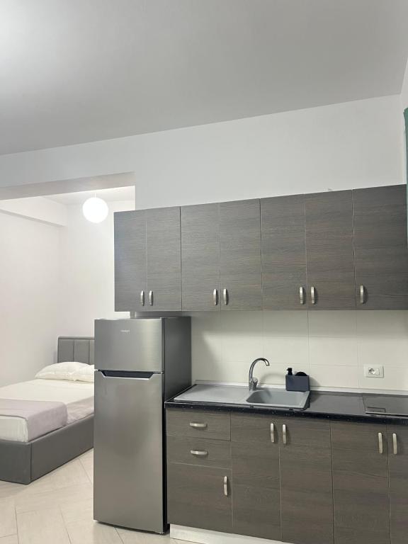 Kuchyň nebo kuchyňský kout v ubytování Blossom Apartments