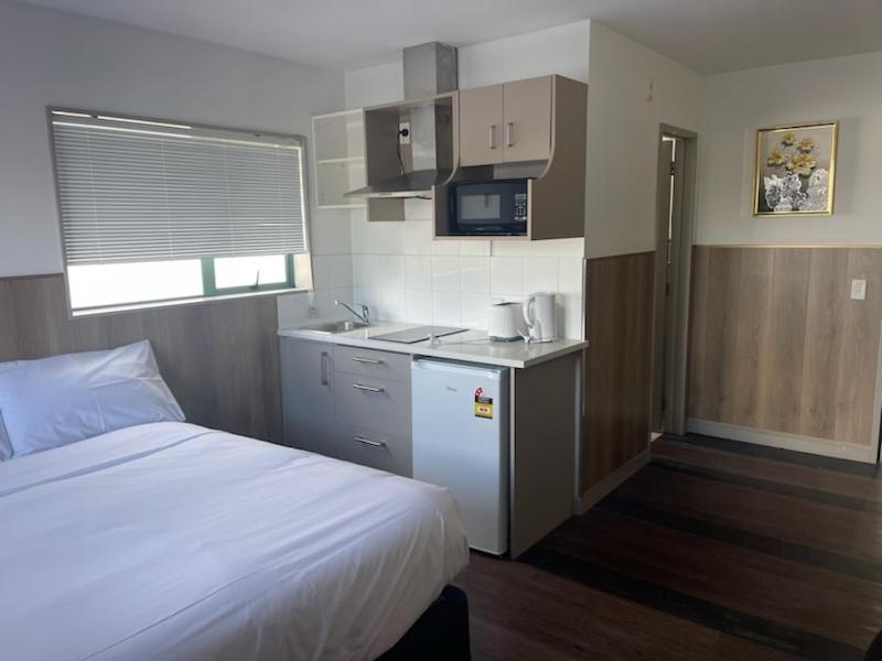 Kuchyň nebo kuchyňský kout v ubytování Conway Motel Manukau