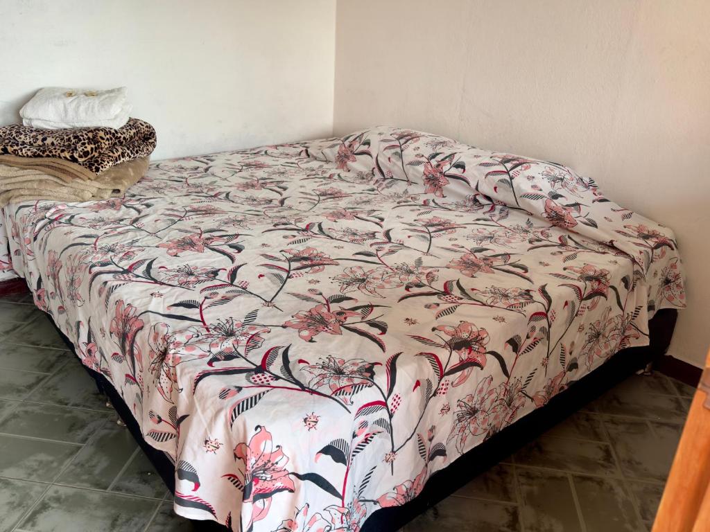 Postel nebo postele na pokoji v ubytování Hostal Inn II Rionegro