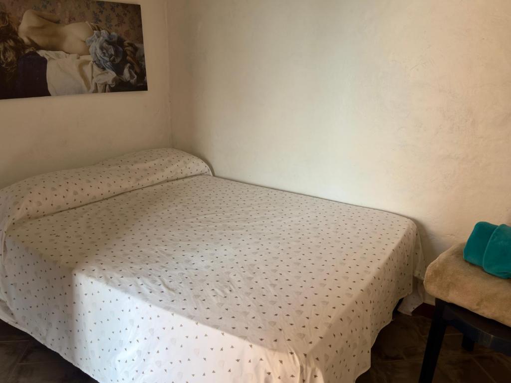 Postel nebo postele na pokoji v ubytování Hostal Inn II Rionegro
