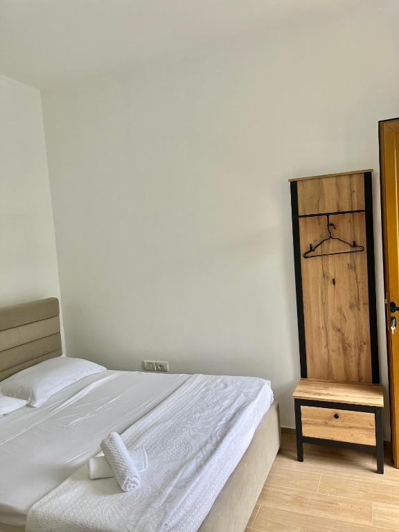 Postel nebo postele na pokoji v ubytování Blossom Apartments