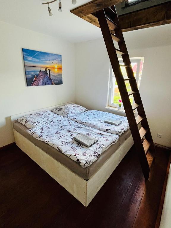 Postel nebo postele na pokoji v ubytování Apartmány 68