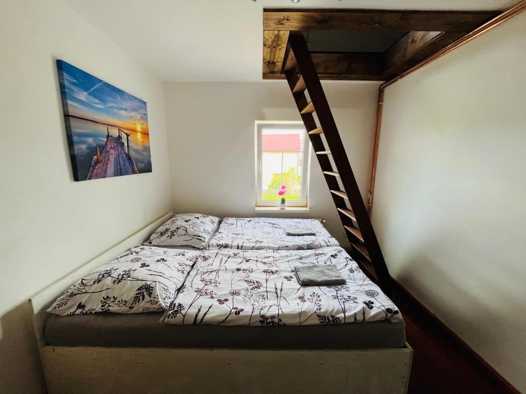Postel nebo postele na pokoji v ubytování Apartmány 68