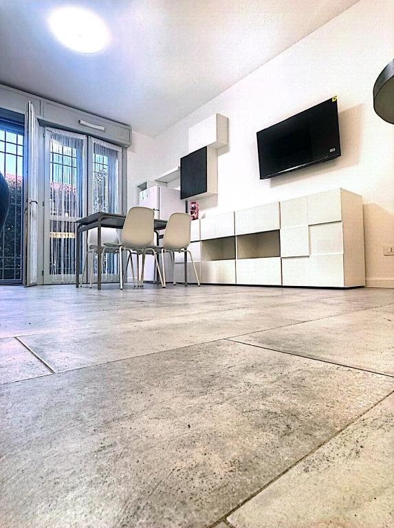 TV a/nebo společenská místnost v ubytování Maison Du Pic - Rho Fiera