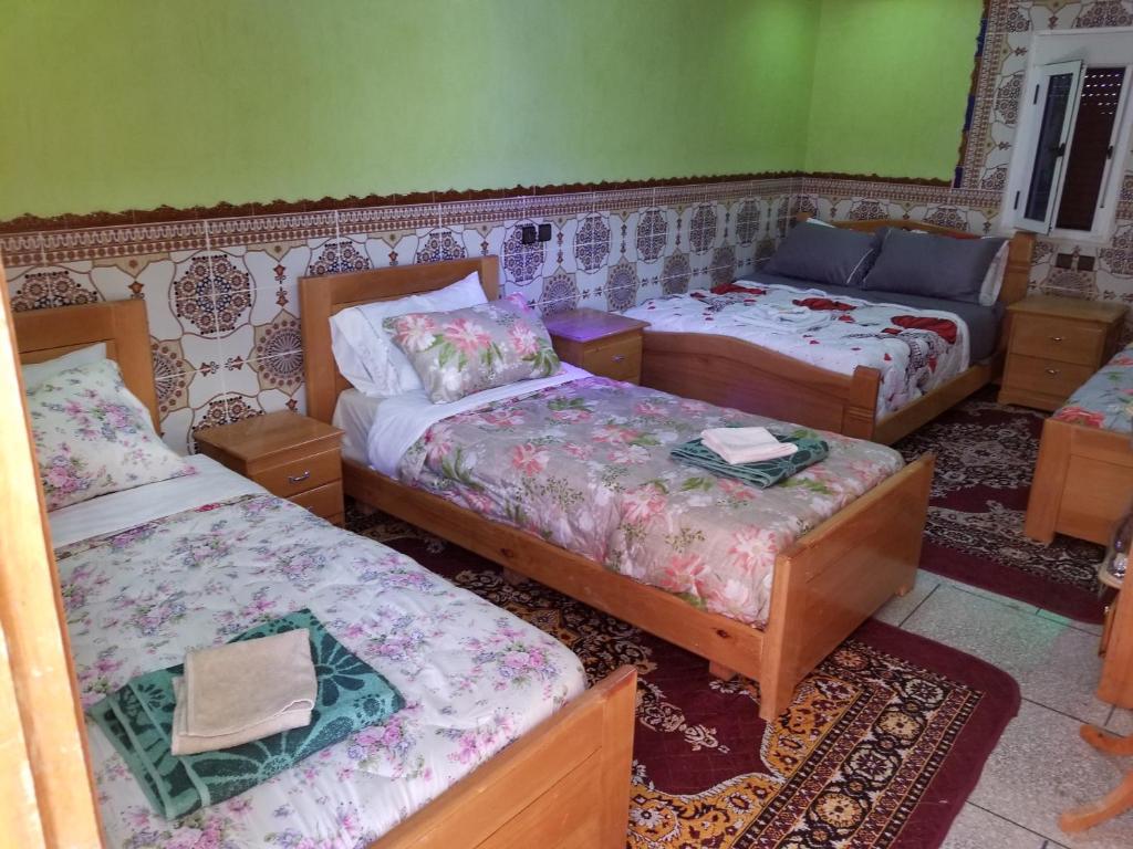 Postel nebo postele na pokoji v ubytování Auberge Cascade Imilchil